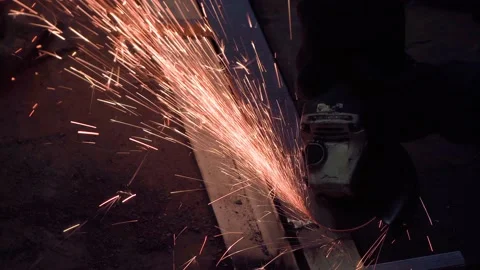 The grinding machine is treated with a weld and sparks fly. Stock Footage 155278510