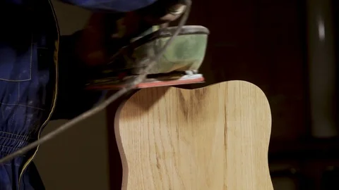 Grinding machine work on a piece of wood Stock Footage 100808111