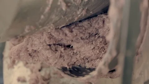 Grinding meat in a factory Stock Footage 78031461