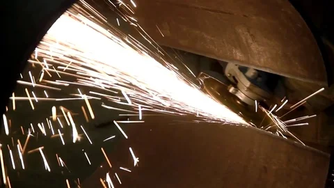 Grinding of metal. Angular grinding machine Stockbeeldmateriaal 74652659