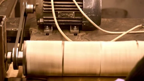 Grinding metal close-up. Worker on a decor factory processing metal Stock Footage 165155167