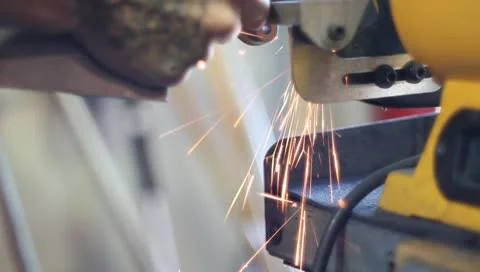 Grinding metal on workbench grinder Stock Footage 10716935