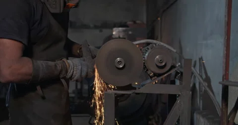 Grinding metal workpiece close up Видео 144589038