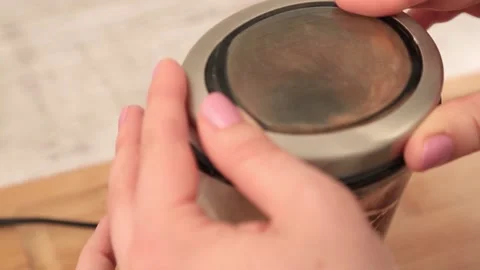 GRINDING ONION PEELS Stock Footage 155653422