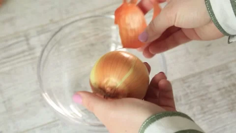 GRINDING ONION SKIN Stock Footage 155653431