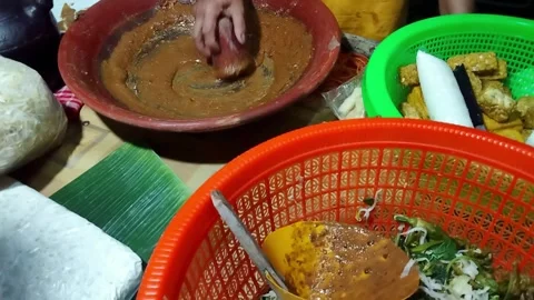 Grinding peanut sauce Stock Footage 242570942