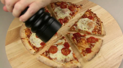Grinding Pepper On To Pizza 스톡 동영상 37006825
