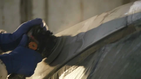 The grinding primered car surface with grind machine. 4K Stock-Footage 86829904