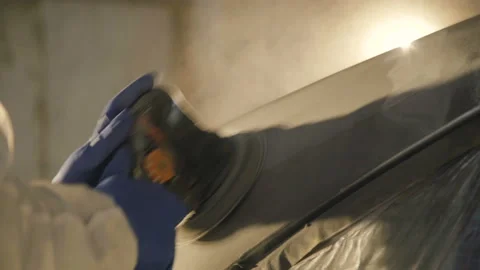 The grinding primered car surface with grind machine. 4K Stock-Footage 86869950