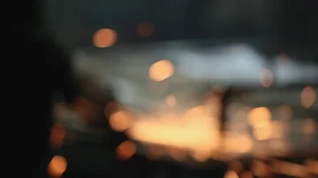 Grinding sparks in bokeh Stock Footage 85551041