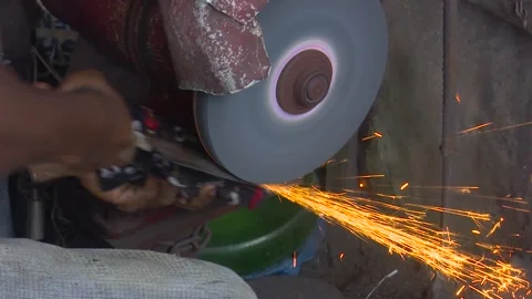 Grinding Sparks with Fire in Workshop Stock Footage 319958581