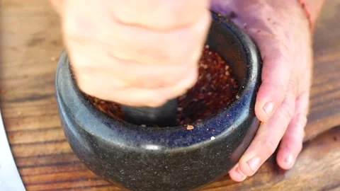 Grinding spices in a grinder Stock Footage 130935634