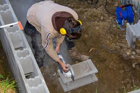 Grinding stones with an angle grinder Stock Photos