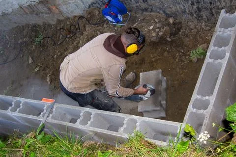 Grinding stones with an angle grinder Stock Photos