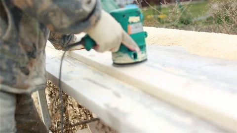 Grinding the surface of the board Stock Footage 97858804