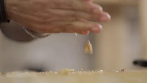 Grinding walnut in slow motion Stock Footage 76369900