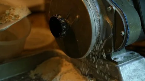 Grinding Wheat in the Kitchen Stock Footage 72419614