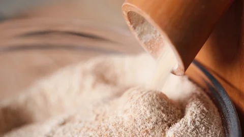 Grinding Wheat to Make Flour Side View Stock Footage 92148818