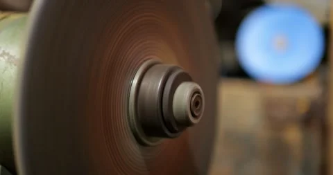 Grinding Wheel Close Up Spinning Down Inertia Slow Motion Deceleration Physics Video stock 321810197