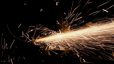 The grinding wheel contact with the iron causes sparks with sound Stock Footage
