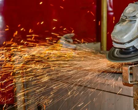 Grinding wheels polished, Sprays from the processing metal Stock Photos