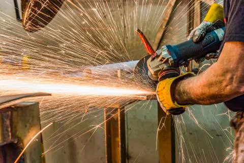 Grinding wheels polished, Sprays from the processing metal Stock Photos