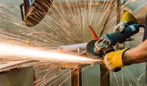 Grinding wheels polished, Sprays from the processing metal Stock Photos