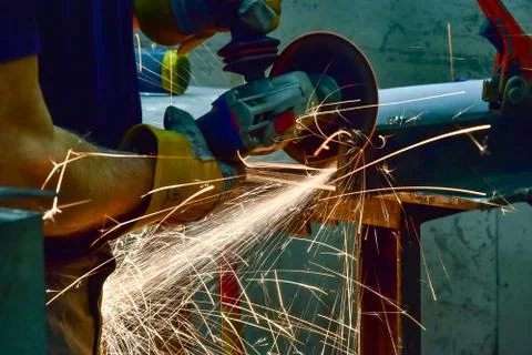 Grinding wheels polished, Sprays from the processing metal Stock Photos