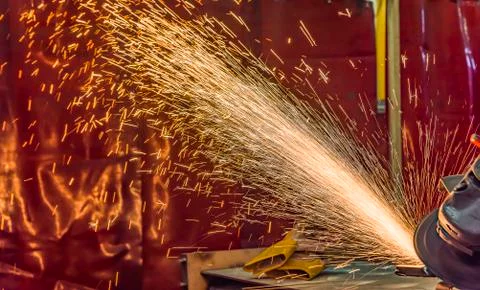 Grinding wheels polished, Sprays from the processing metal Stock Photos