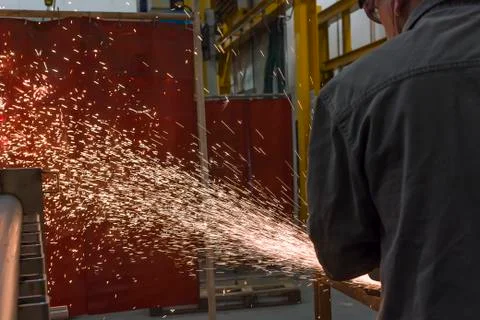 Grinding wheels polished, Sprays from the processing metal Stock Photos