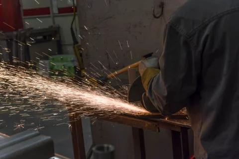 Grinding wheels polished, Sprays from the processing metal Stock Photos