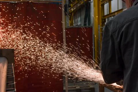 Grinding wheels polished, Sprays from the processing metal Stock Photos