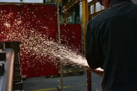 Grinding wheels polished, Sprays from the processing metal Stock Photos