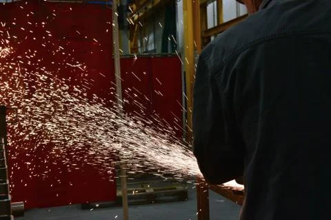 Grinding wheels polished, Sprays from the processing metal Stock Photos