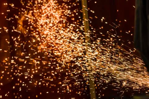Grinding wheels polished, Sprays from the processing metal Stock Photos