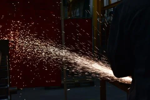 Grinding wheels polished, Sprays from the processing metal Stock Photos