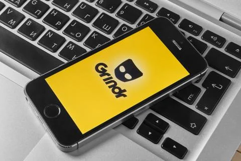 Grindr app on iPhone 5s Stock Photos