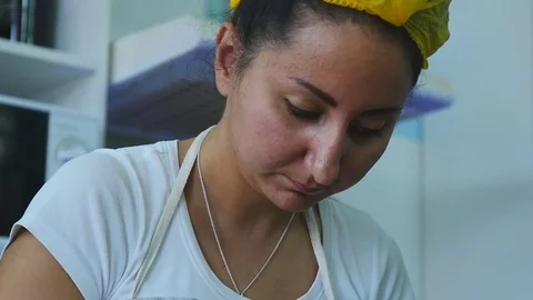 Grinds peanuts in the kitchen Stock Footage 75516839