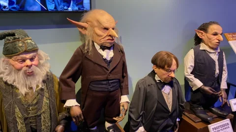 Gringotts Goblin Professor Flitwick and Griphook in the Harry Potter Studio Tour Stock Footage 326654595