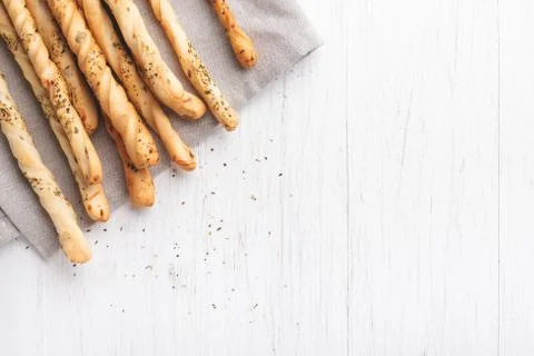 Grissini on the table. Stock Photos
