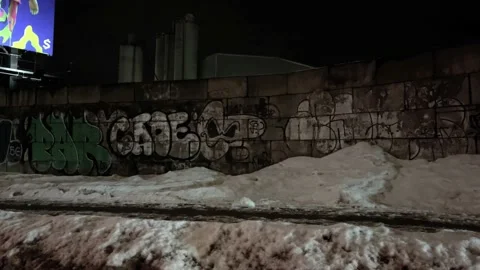 Gritty graffiti and snow on low stone wall Williamsburg Brooklyn winter NYC 스톡 동영상 148344638