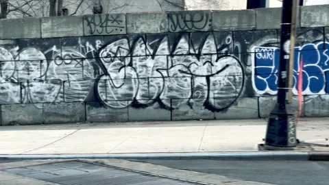 Gritty graffiti from moving car in traffic in Brooklyn New York City NYC Video stock 146877209