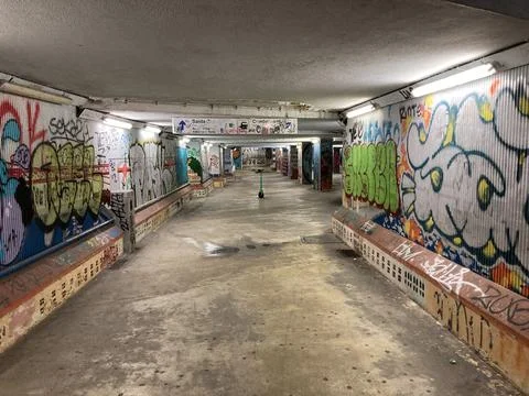Gritty grime underground underpass with electric scooter in City view of Lisbon Stockfoto's