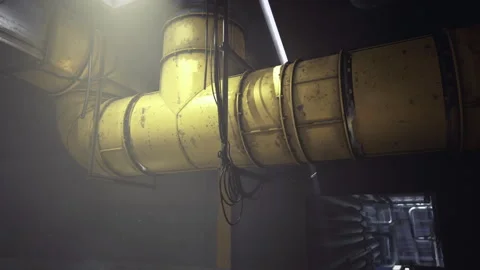 Gritty industrial setting with safety features and dim passageway Video stock 335102568