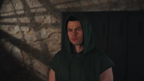 Gritty man makes eye contact after intense workout Stock Footage 306530399