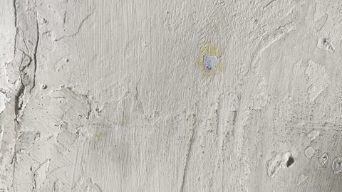 Gritty wall surface with horizontal layout of scratches and erosion pattern.. Stock Photos