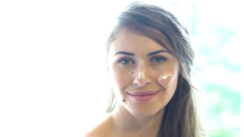 Grl with cream on face. Stock Footage 105834848