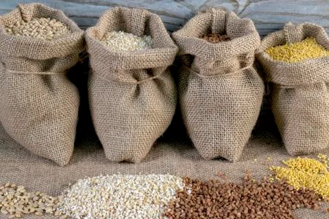 Groats in bags. Stock Photos