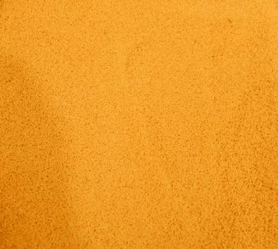 Groats raw couscous yellow. Solid background Stock Photos