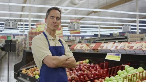 Grocer looking at camera Stock Footage 79976227